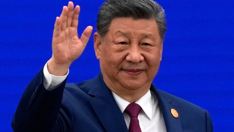 Chinese President Xi Jinping waves as he arrives at the opening ceremony for the World AI Conference in Shanghai, Friday, July 17, 2026.
