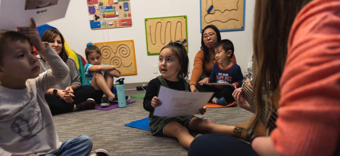 Melisa Alexandra Castro’s daughter, Michelle, 3, participates in a musical playgroup led by music therapist Marisa DiCamillo at The Music Therapy Center in Kearny Mesa on Nov. 19, 2022.