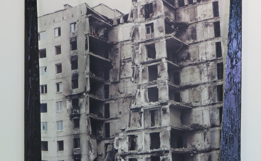 Nikita Kadan printed a photograph on silk depicting bomb damage but it comes from fighting in Ukrain's Donbas region in 2015, not the current war.
