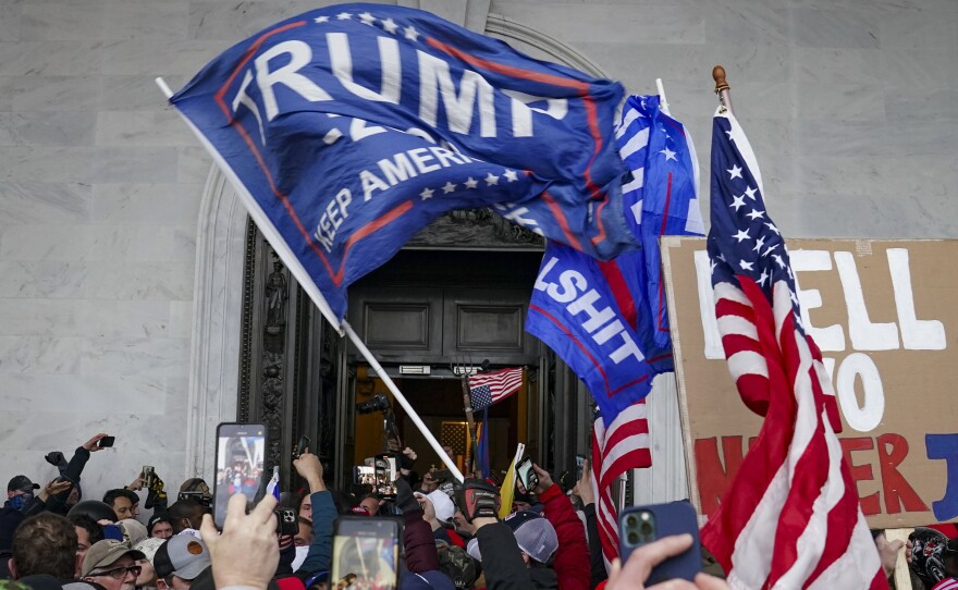 Rioters break into the U.S. Capitol on Jan. 6.