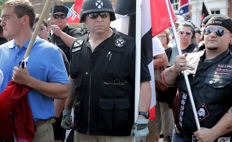 Hundreds of white nationalists, neo-Nazis and members of the "alt-right" march down East Market Street toward Emancipation Park during the "Unite the Right" rally August 12, 2017 in Charlottesville, Virginia.