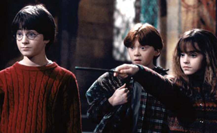 Daniel Radcliffe, Rupert Grint, and Emma Watson in the first film, "Harry Potter and the Sorcerer's Stone."