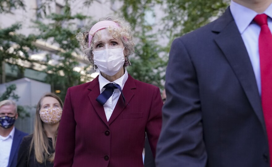 E. Jean Carroll (left), who has accused President Trump of raping her in the 1990s, leaves federal court in New York City after a hearing last week in her defamation lawsuit.