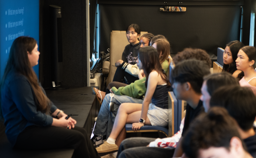 Students inside the Mobile Museum of Tolerance listen to presenter Ewa Geisler on April 23, 2026, at Westview High School.