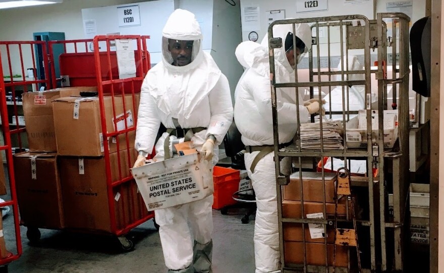 Department of Defense personnel screen mail as it arrives at a U.S. government facility in Washington, D.C., earlier this week after letters received at the Pentagon were suspected of containing deadly ricin.