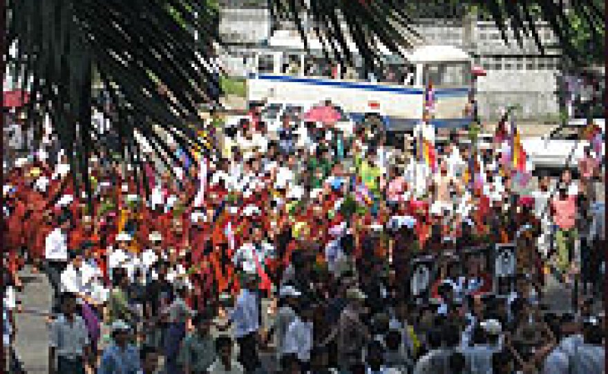 Tens of thousands of people pour into the streets in protest Tuesday.