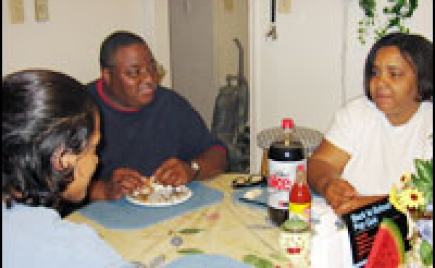 Giovanni, 16, (left) crossed the border into Arizona when he was just 12. He's pictured with his foster family in Richmond, Va., with whom he is living while he waits for a Special Immigrant Juvenile Visa, designed for those who've been abused or neglected.
