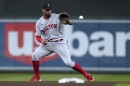 File photo of Boston Red Sox's Xander Bogaerts fielding the ball hit by Minnesota Twins' Luis Arraez during the fifth inning of a baseball game Aug. 31, 2022, in Minneapolis.