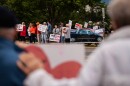 Demonstrators attend a candlelight vigil Wednesday in Fairfax, Va., for the victims of the Uvalde and Buffalo mass shootings.