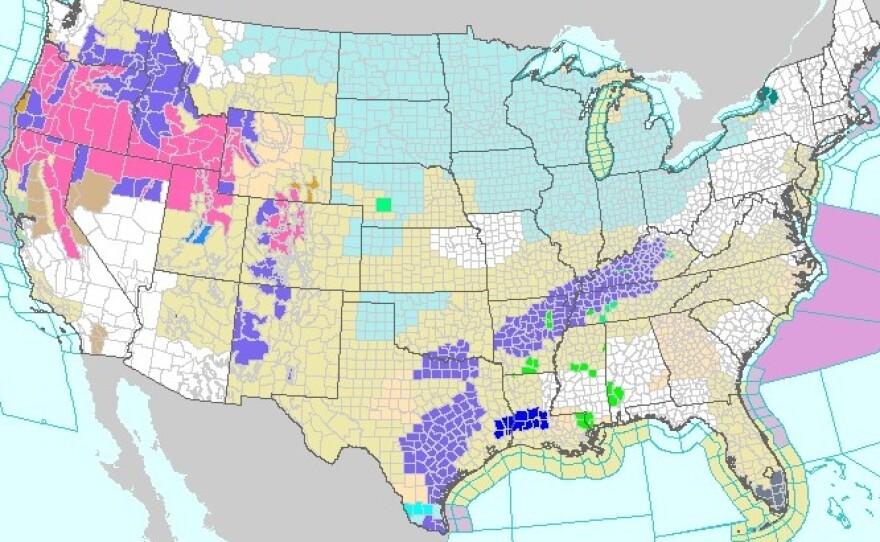 Weather map from the National Weather Service showing winter storm warnings in pink.