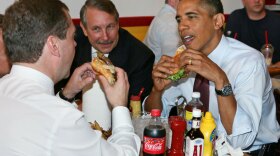 President Obama and Russian President Dmitry Medvedev eat cheeseburgers Thursday at Ray's Hell Burger in Arlington, Va., a few miles from the White House. The two leaders met briefly in the Oval Office earlier and later held a news conference.