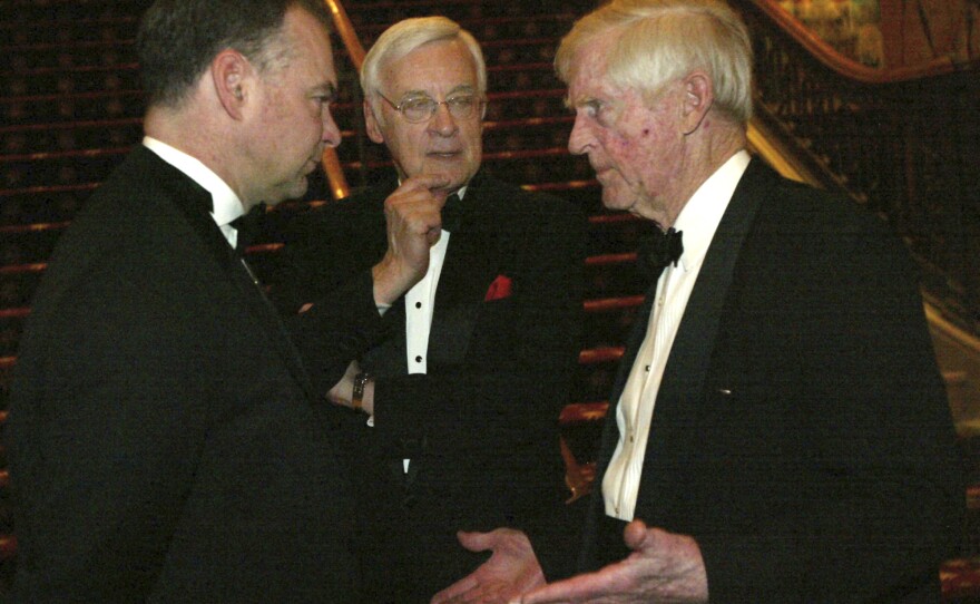 Gov. Kaine, (left), speaks with his father-in-law and former Virginia Gov. Linwood Holton, (right), as former Gov. Gerald Baliles listens during an event in 2007, in Richmond, Va.