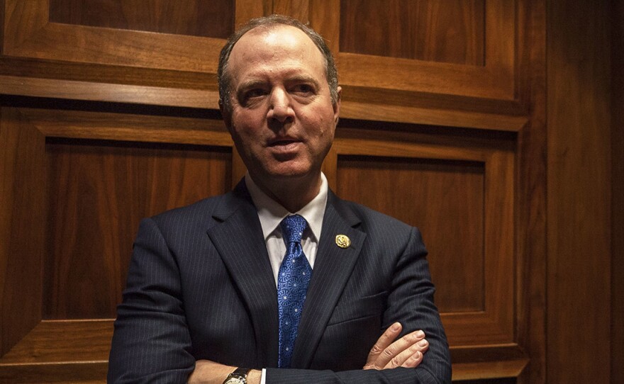 House Intelligence Committee Chairman Adam Schiff, D-Calif., heads to a news conference on Tuesday.