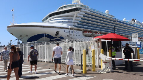 Pedestrians walk past the Ruby Princess docked at San Diego's Broadway Pier on Monday, Sept. 14, 2026.
