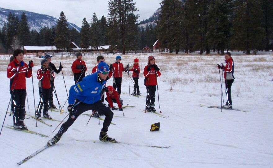 Olympic hopeful Erik Bjornsen demonstrates racing technique at a kids' ski clinic in Mazama, Wash. He hopes to join his sister Sadie at the Winter Olympics.