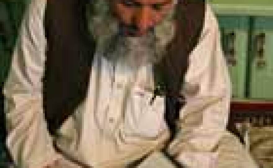 Mullah Malawi Abduhlah Fayaz is a leader of the effort in Kandahar to support September's election on religious grounds. He opposed Taliban rule and says the Koran supports democracy and voting by women.