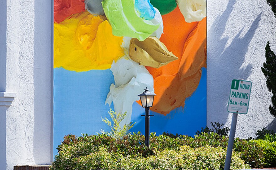 The project includes a mural by local artist Richard Allen Morris. It's called "Applied" and it's located on Fay Avenue.