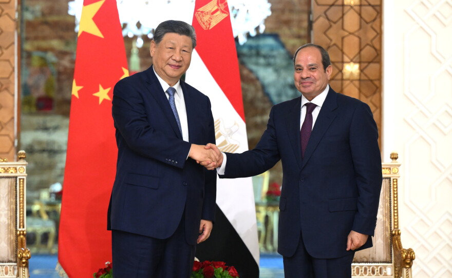 In this photo released by Xinhua News Agency, visiting Chinese President Xi Jinping, left, shakes hands with Egyptian President Abdel-Fattah el-Sissi prior to their meeting in Cairo, Egypt, Wednesday, Sept. 2, 2026.