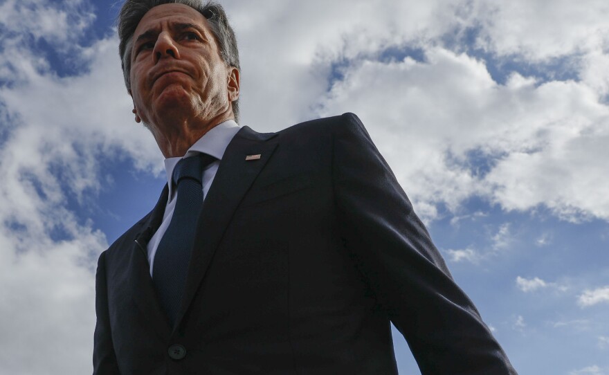 U.S. Secretary of State Antony Blinken walks to board a plane after his meetings with Turkish counterparts, as he departs from Ankara Esenboga Airport in Ankara, Turkey, on Monday.