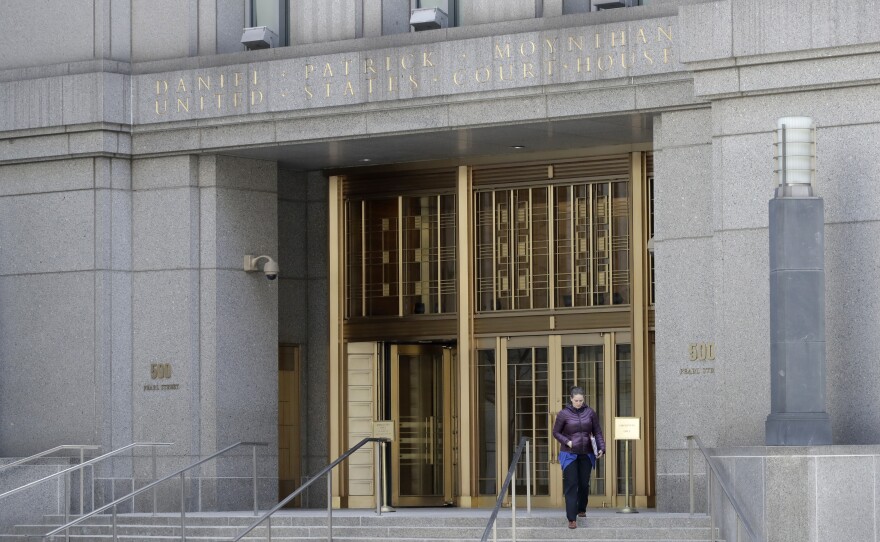 A woman leaves the Daniel Patrick Moynihan United States Courthouse on Nov. 20, 2017, in New York. On an especially cold February day earlier this year, on the 23rd floor of Moynihan Courthouse, Judge Alvin Hellerstein heard arguments to (again) decide whether President Trump could nix his hush money payment conviction.