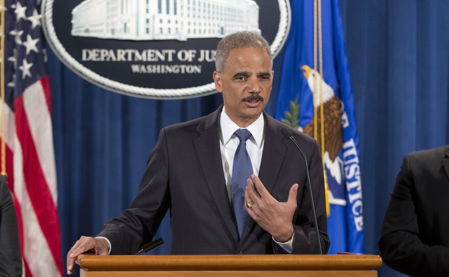 Attorney General Eric Holder announced Thursday that the Justice Department's civil rights division will launch a broad civil rights investigation in the Ferguson, Mo., police department.