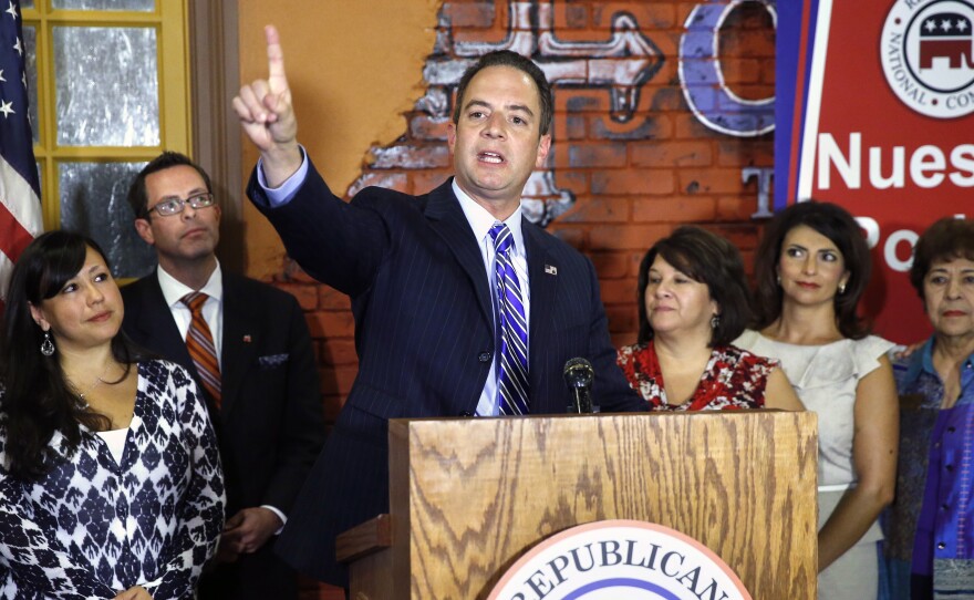 Republican National Committee Chairman Chairman Reince Priebus speaks at a news conference with state Republican Hispanics at a Mexican restaurant in Aurora, Colo., in 2014.
