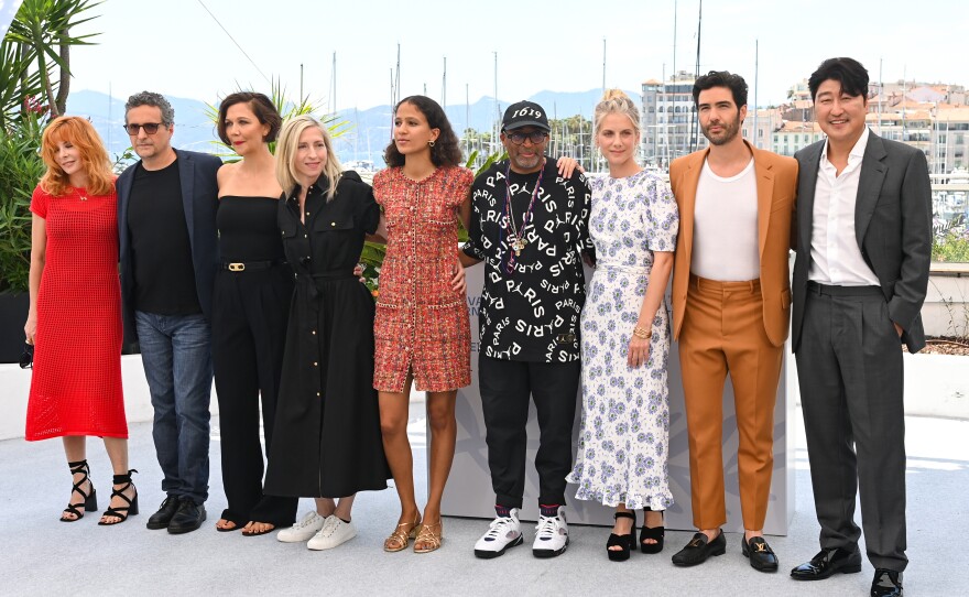 Jury members Mylène Farmer, Kleber Mendonça Filho, Maggie Gyllenhaal, Jessica Hausner, Mati Diop, jury president Spike Lee, jury members Mélanie Laurent, Tahar Rahim and Song Kang-ho attend the Jury photocall during the 74th annual Cannes Film Festival on July 6, 2021, in Cannes, France.