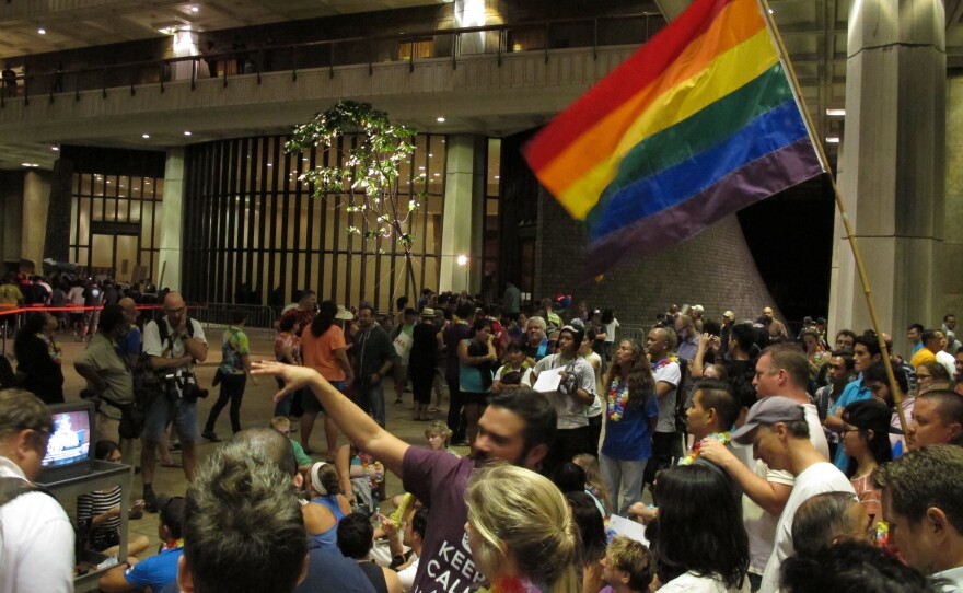 Proponents of gay marriage rally outside state House chambers at the Hawaii Capitol in Honolulu on Nov. 8.