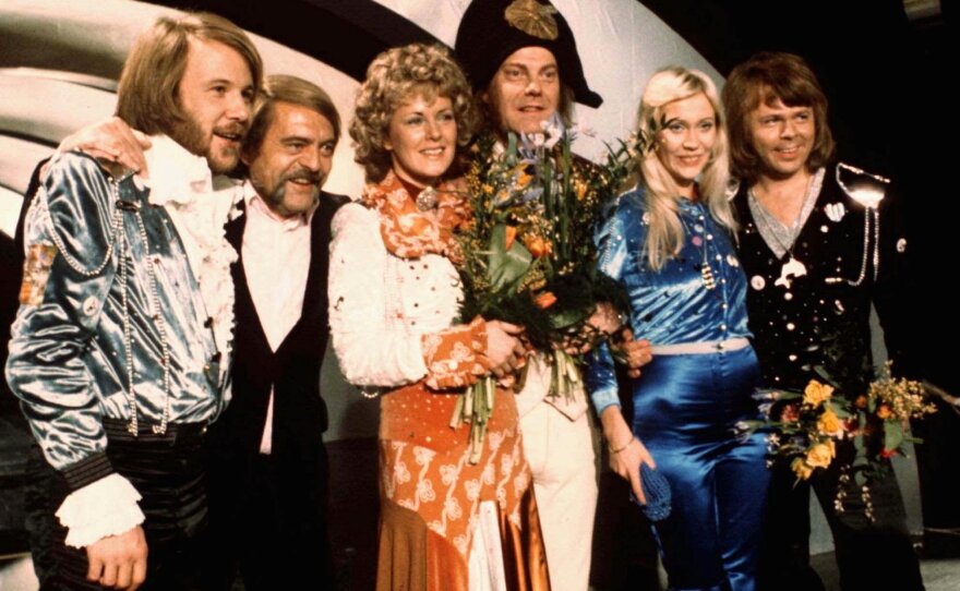 Members of Swedish group ABBA, and their associates, celebrate the victory of their song "Waterloo" in the Eurovision Song Contest in Brighton, England, in April 1974. The U.K. has hosted the competition more than half a dozen times.