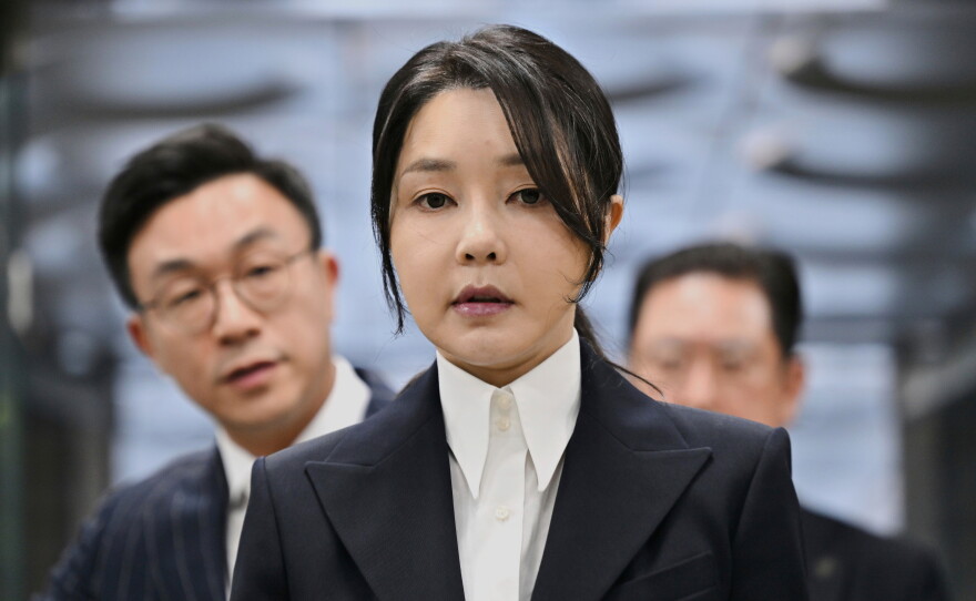 FILE - South Korea's former first lady Kim Keon Hee, wife of impeached former president Yoon Suk Yeol, arrives at a court to attend a hearing to review her arrest warrant requested by special prosecutors, in Seoul, South Korea, on Aug. 12, 2025.