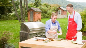 Test cook Julia Collin Davison and host Chris Kimball grill on the set of "Cook's Country."