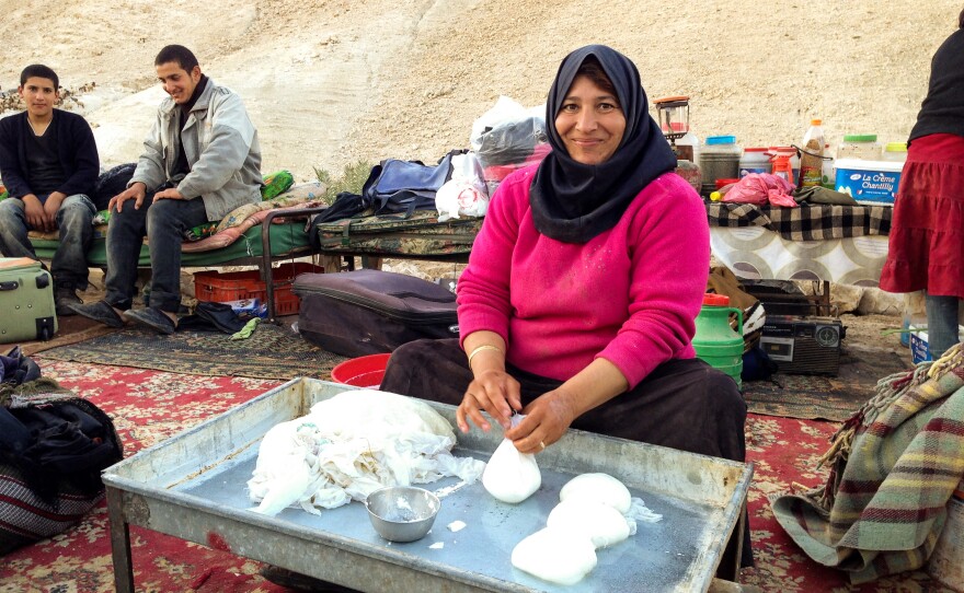 Mechchas Bne Menneh turns goat and sheep milk into salty white cheese, jibneh baida. She will rinse and squeeze each bundle of salted milk many times in the process.