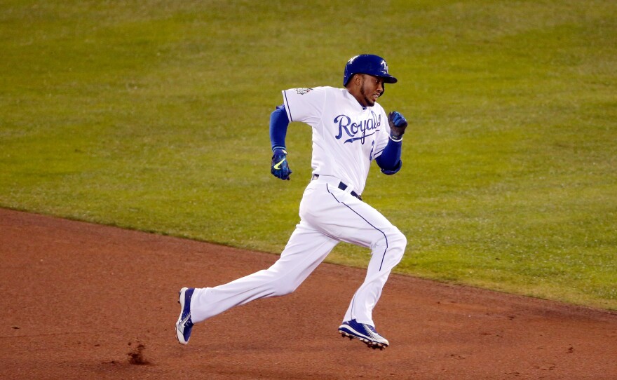 Alcides Escobar of the Kansas City Royals sprints around the bases during an inside-the-park home run in the first inning Tuesday night.