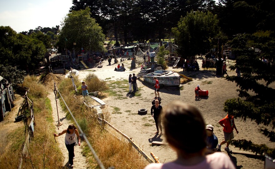 An overview of the Berkeley Adventure Playground, where children and their parents can paint, hammer, saw, and run free.