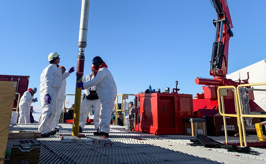 Brad Rosenheim and Al Gagnon working the gravity corer in this undated photo