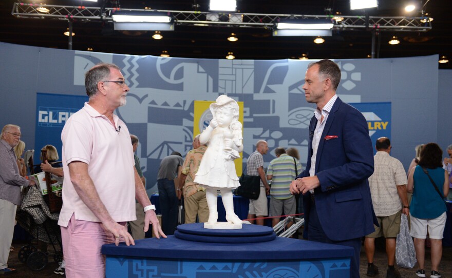 Sebastian Clarke (right) appraises an 1883 Egisto Del Panta marble sculpture in Palm Springs, Calif. ANTIQUES ROADSHOW “Kids Stuff” airs Monday, November 3 at 8/7C PM on PBS.