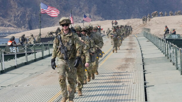 FILE - U.S. Army soldiers cross a floating bridge on the Imjin River during a joint river-crossing exercise between South Korea and the United States as a part of the Freedom Shield military exercise in Yeoncheon, South Korea, March 20, 2025.