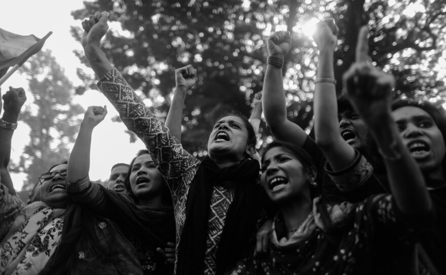 In November 2013, garment workers and leaders protest the deaths of their coworkers, who were killed in the Rana Plaza fire.