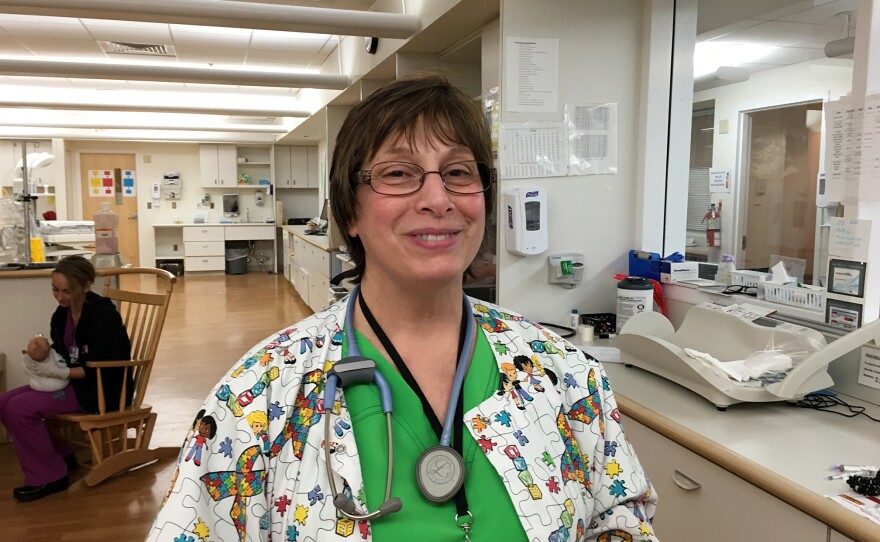 Cindy Robin, a registered nurse at Women and Infants Hospital in Providence, R.I., helps newborns through symptoms of withdrawal.
