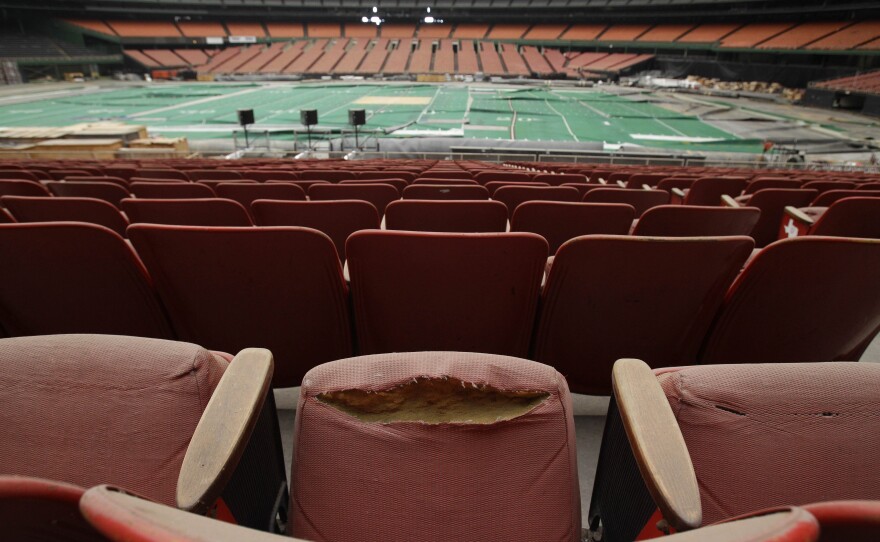 Rows of dirty, tattered seats ring the Astrodome in Houston on May 21, 2012. Once touted as the Eighth Wonder of the World, the nation's first domed stadium was last used in 2009.