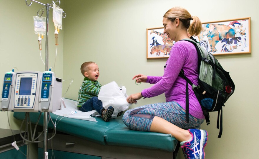 Meg and Luke Whitbeck wait to be seen by the cardiologist at Maria Fareri Children's Hospital in Hawthorne, N.Y., in October.