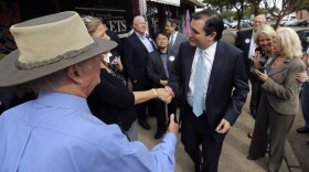 Republican Ted Cruz (center), a candidate for U.S. Senate, greets voters in Mesquite, Texas, last month. Cruz has an 18-point lead over his challenger.