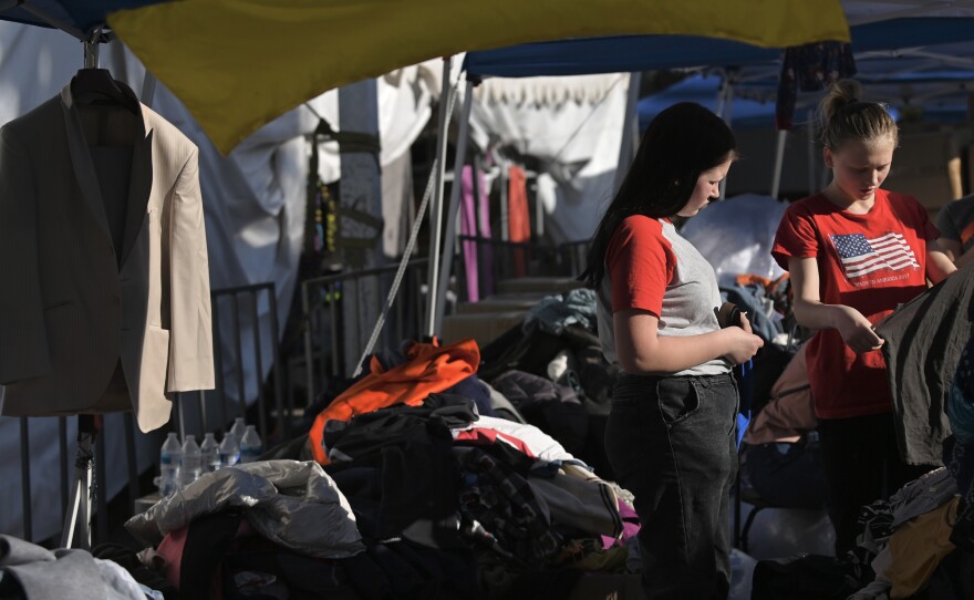 At the shelter, women picked out donated clothing.