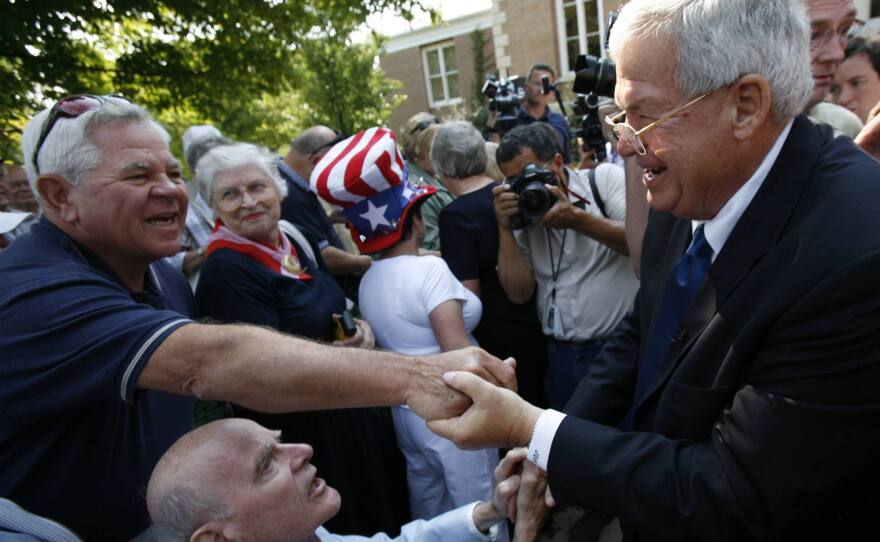 Then-U.S. Rep. Dennis Hastert greets a supporter in Yorkville, Ill., in August 2007, after he announced that he would not seek another term in Congress. Hastert was indicted May 28 on charges of evading cash-withdrawal reporting requirements and lying to the FBI, in connection with what the indictment described as $3.5 million in hush money slowly taken out and paid to an unnamed individual.