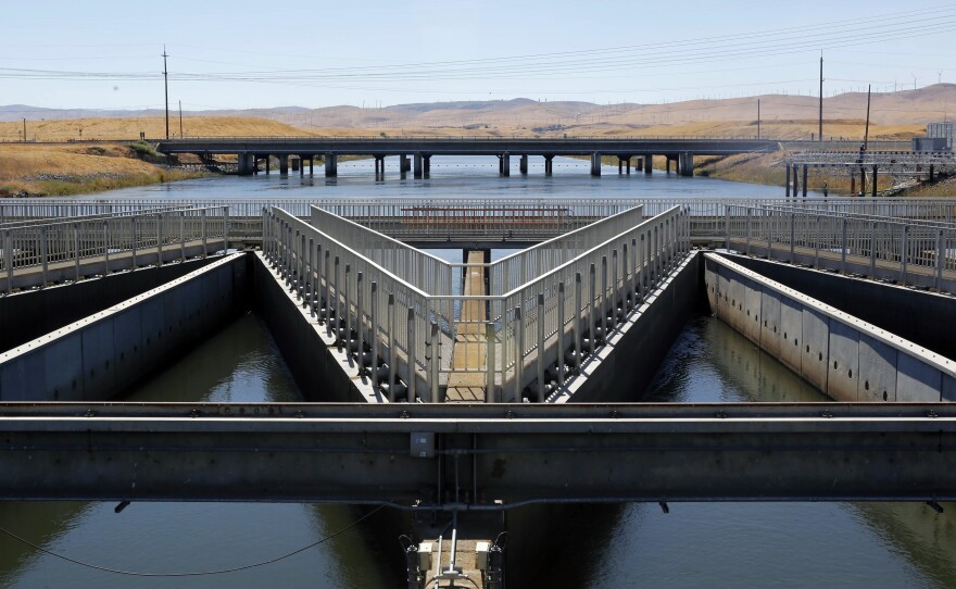 Diversion facilities like this one help protect endangered fish in California. Environmentalists say such protections would be weakened under a Trump administration plan to send more water to the state's farmers.