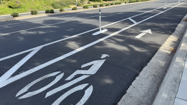 Pictured, a bike lane in Vista, Calif, where the asphalt berm has been removed, leaving only the bollard. June 25, 2025