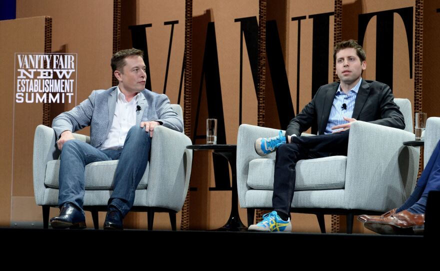 Elon Musk and Sam Altman speak at the Vanity Fair New Establishment Summit at Yerba Buena Center for the Arts on October 6, 2015 in San Francisco, California.