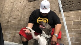 Angel Gomez with his dog Luna at the Project Homeless Connect East County, April 12, 2019.