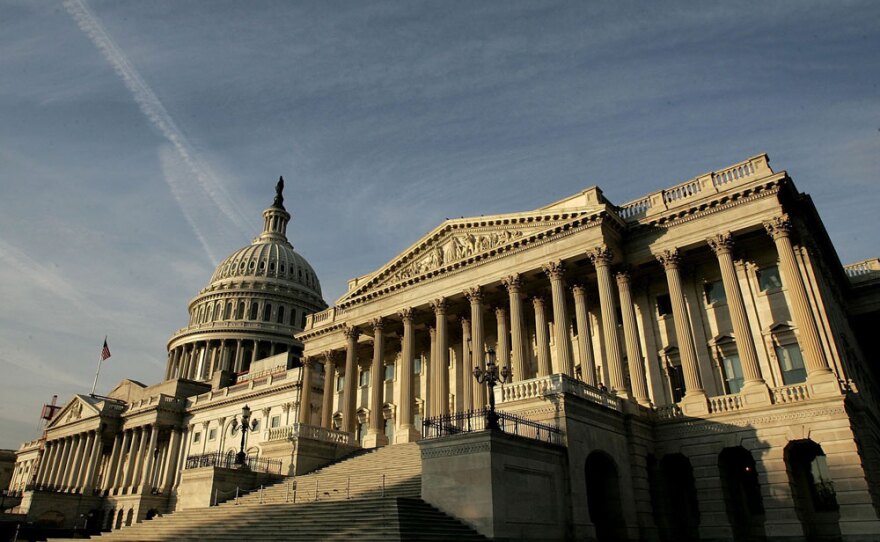 The early morning sun strikes the U.S. Capitol on the day before midterm elections in November 2006.