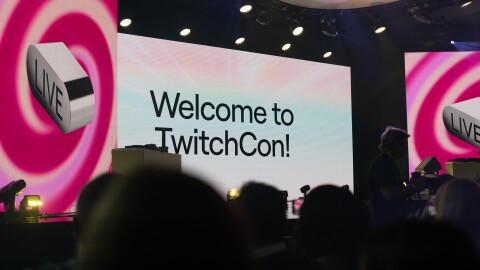 TwitchCon attendees get ready to watch the TwitchCon Opening Ceremony at the San Diego Convention Center on Oct. 17, 2025. This is the 10th year of the livestreaming convention. 